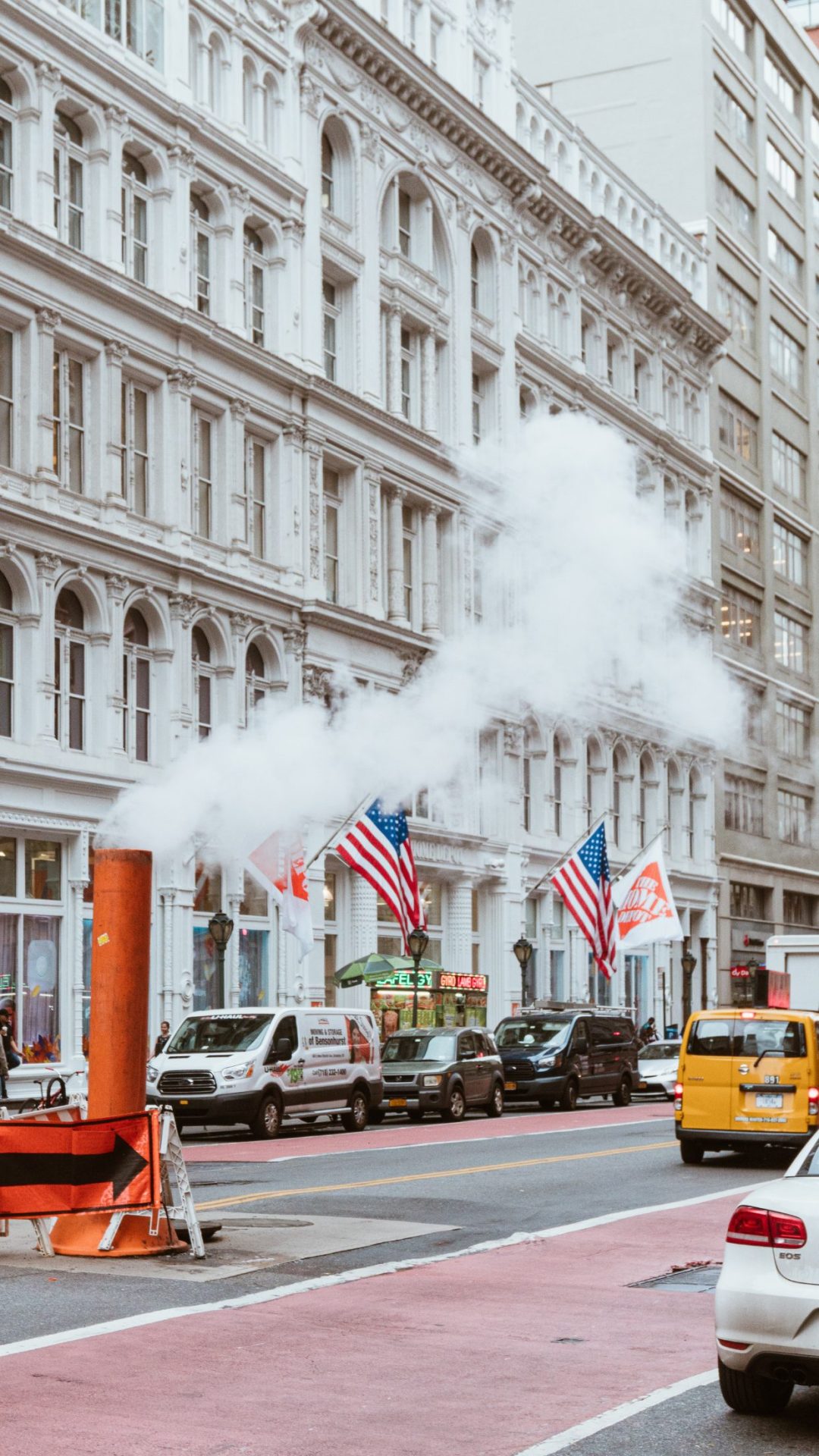 Beautiful New York City architecture with American flags