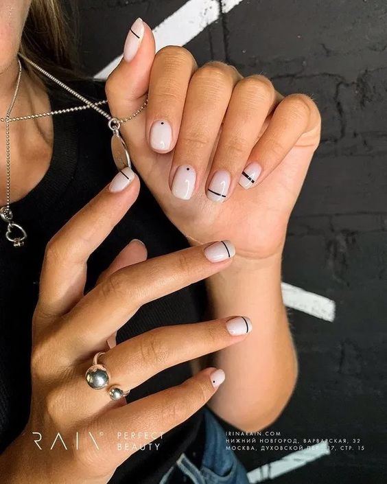 Black and white minimalist short nail designs.