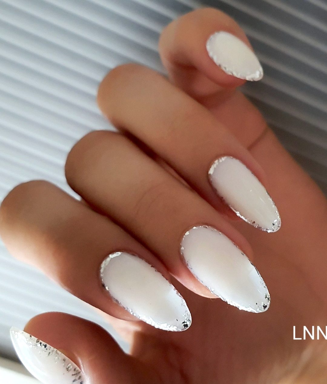 Matte white wedding nails with silver outlines