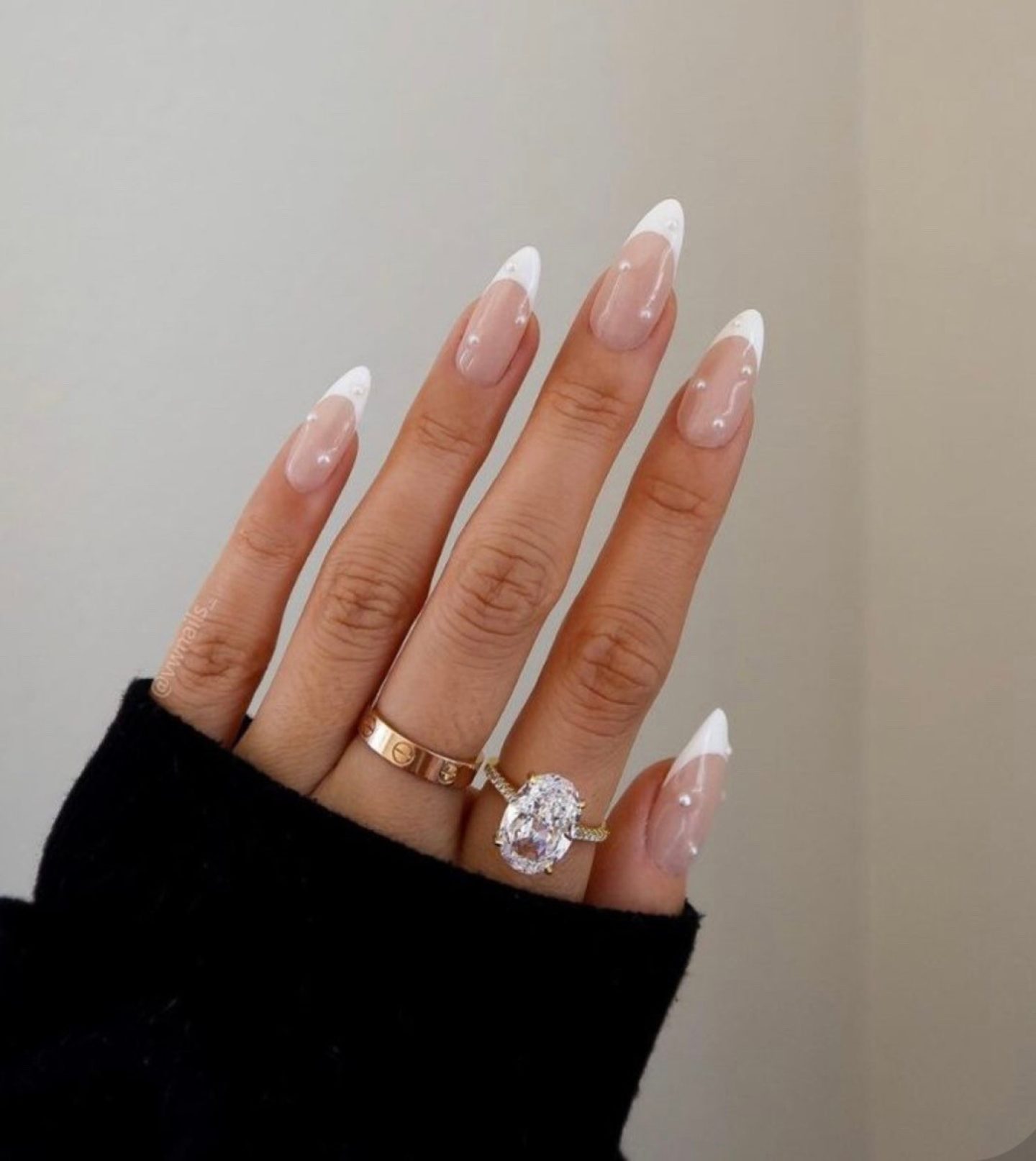 Pretty French tip nails with pearls for brides
