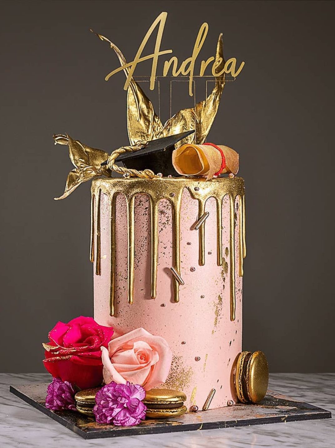 Elegant pink graduation drip cake