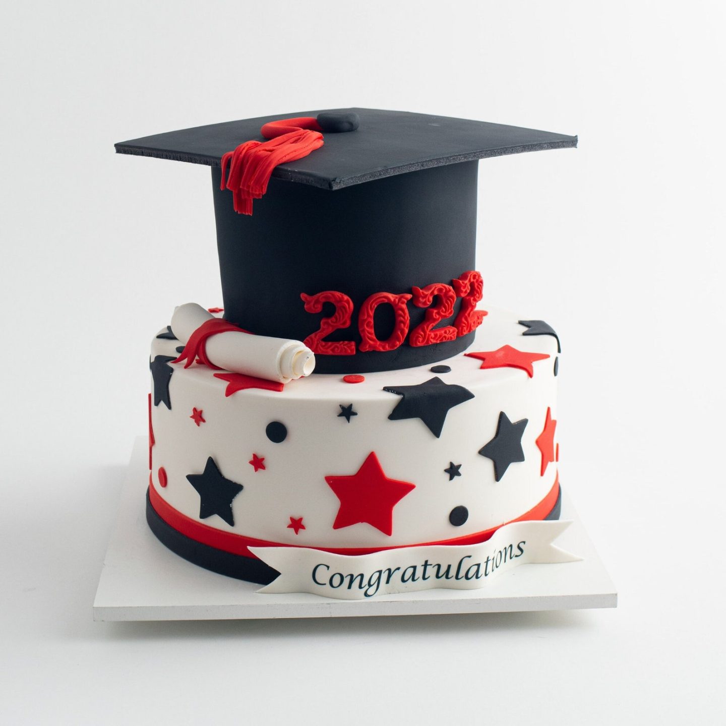 Custom grad cake with white, black and red stars