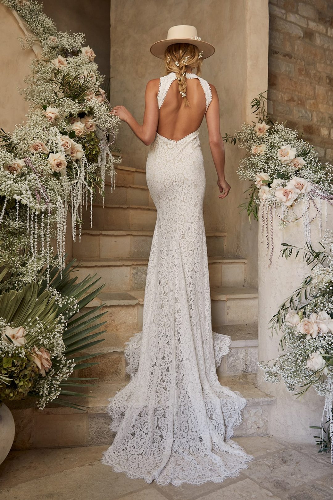 Affordable lace wedding dress with mermaid tail and backless detail