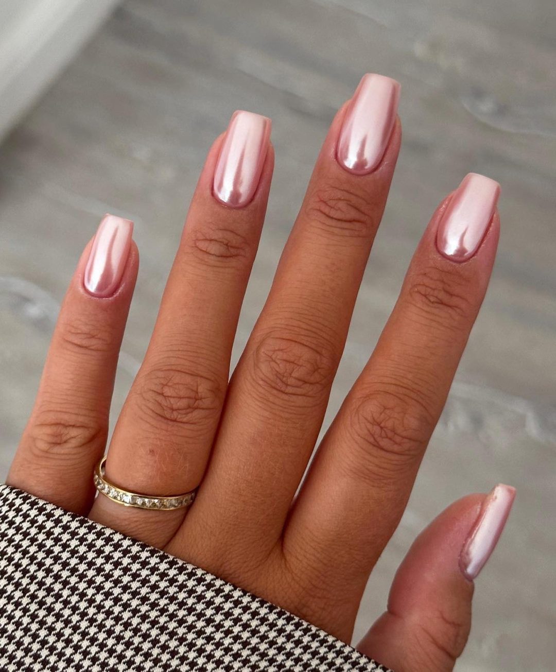 Rose gold chrome nails.