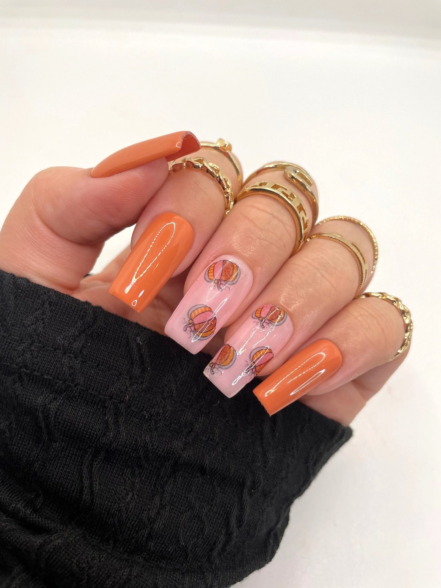 Pretty burnt orange fall nails with pumpkins