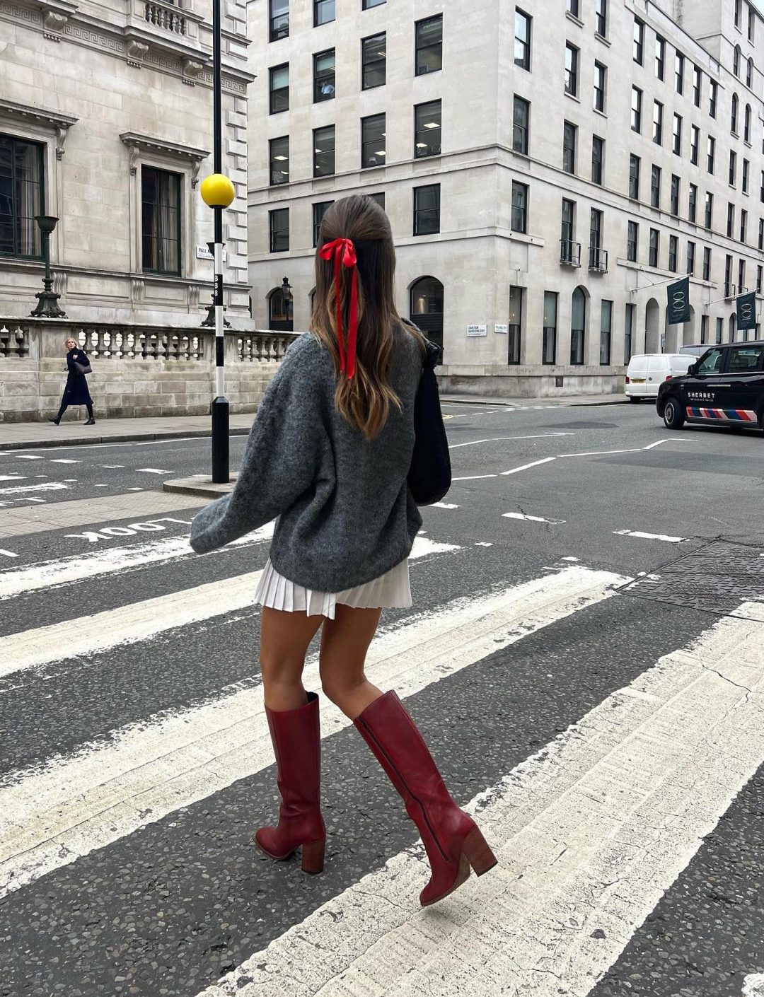 Preppy fall outfit wit burgundy boots.