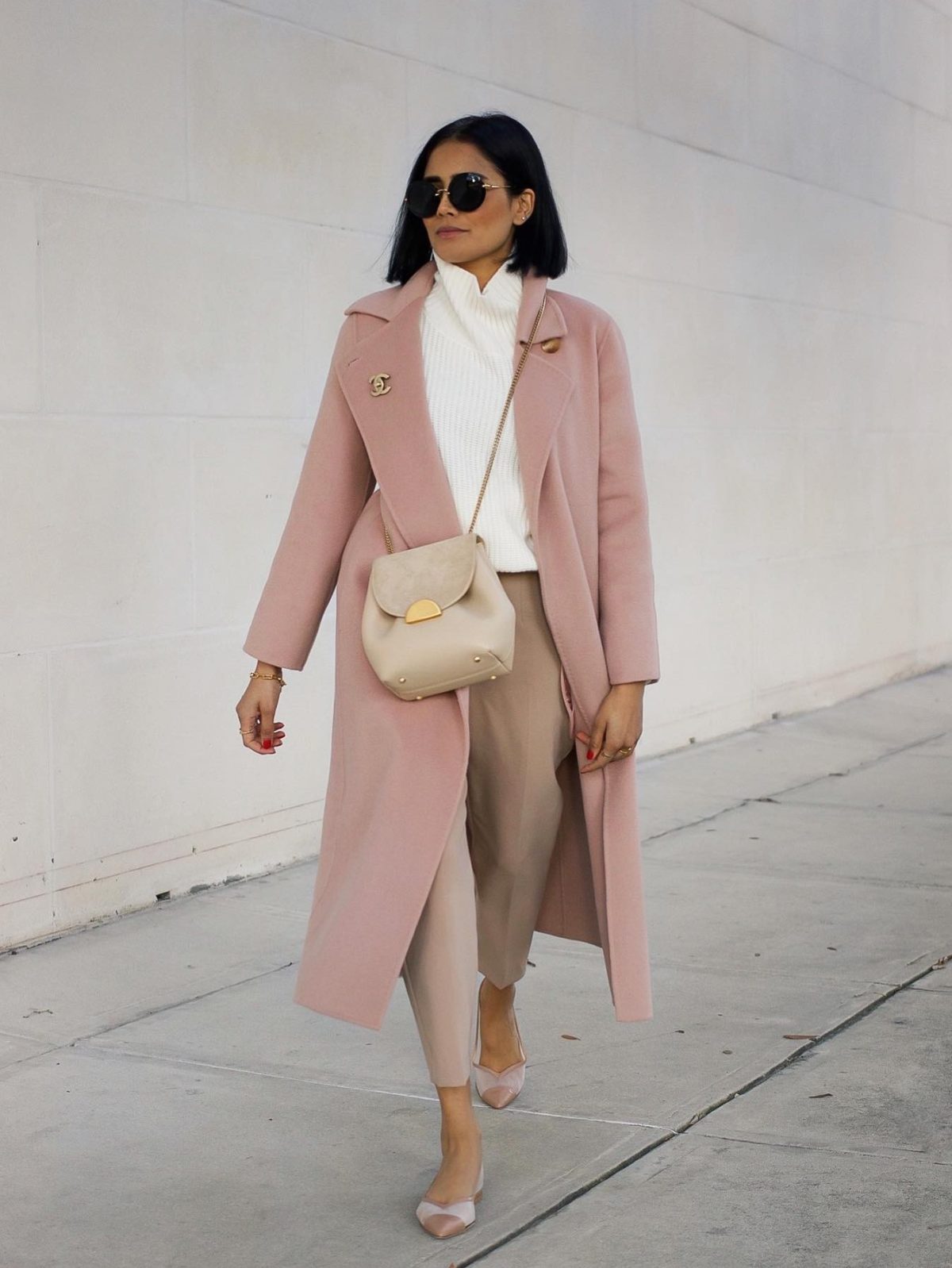 Spring outfit with a pastel pink trench coat.