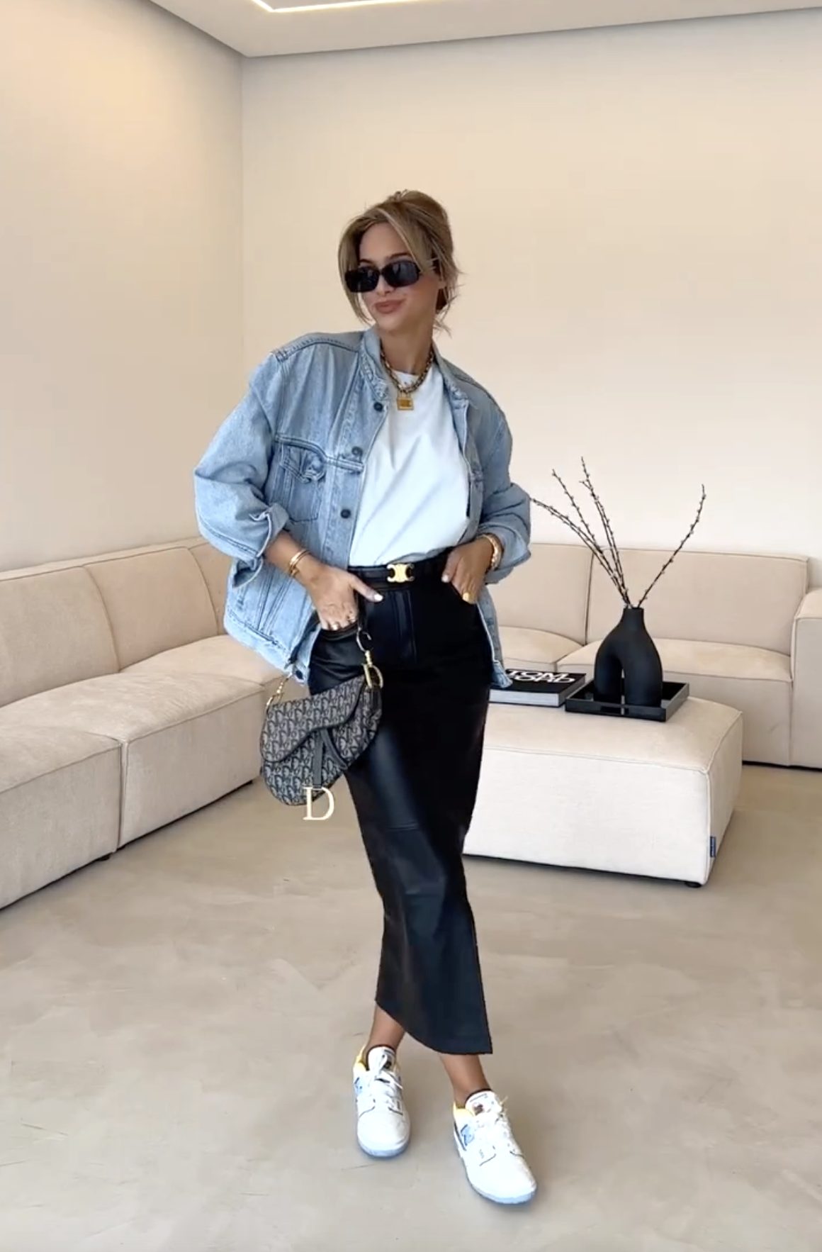 Black leather maxi skirt with a denim jacket