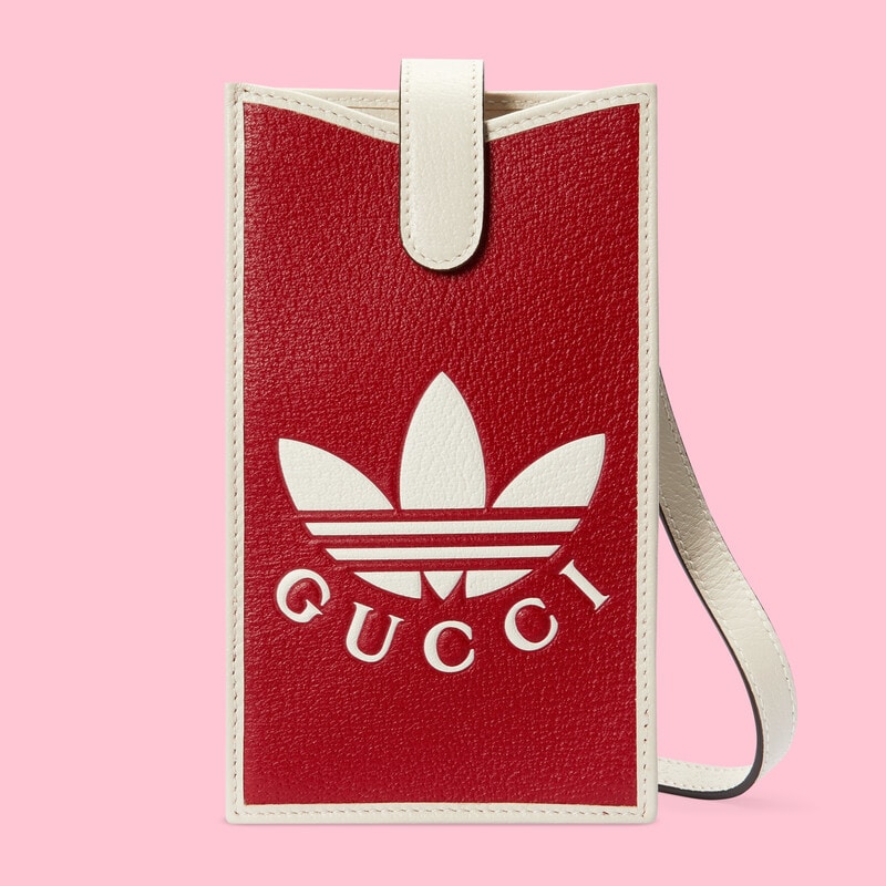 White and red Adidas x Gucci phone case 