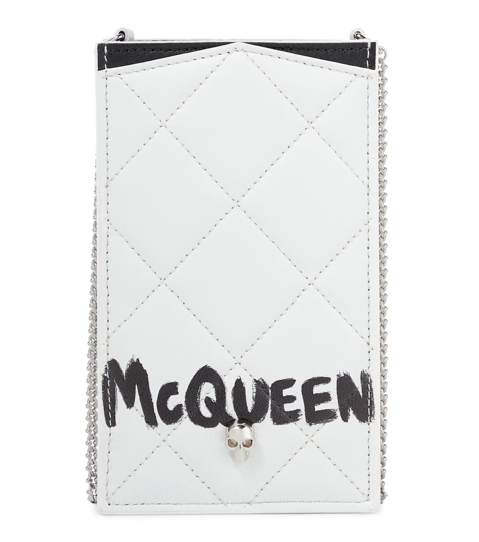 Black and white Alexander McQueen Graffiti leather crossbody phone pouch 