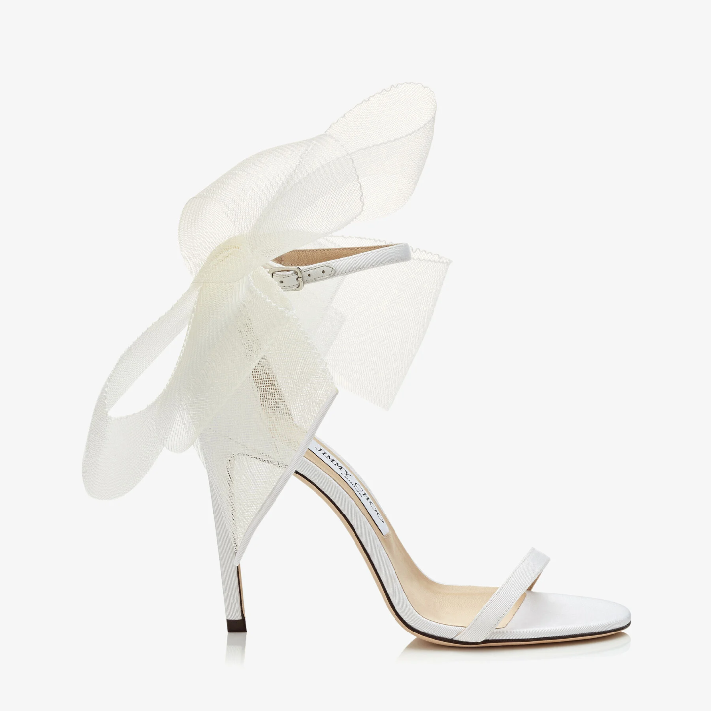 Best designer wedding shoes: White Jimmy Choo Aveline 100 Latte Sandals with Asymmetric Grosgrain Mesh Fascinator Bows