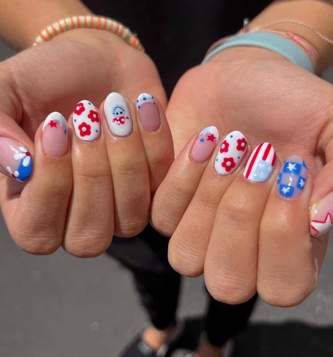 White, red and blue mix and match patriotic nails.