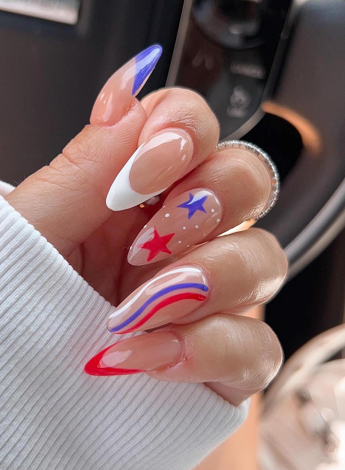 Red, white and blue nails with stars and stripes.