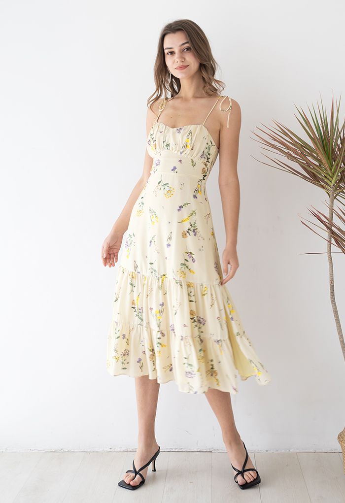 Light yellow dress with ruffles and field flower print