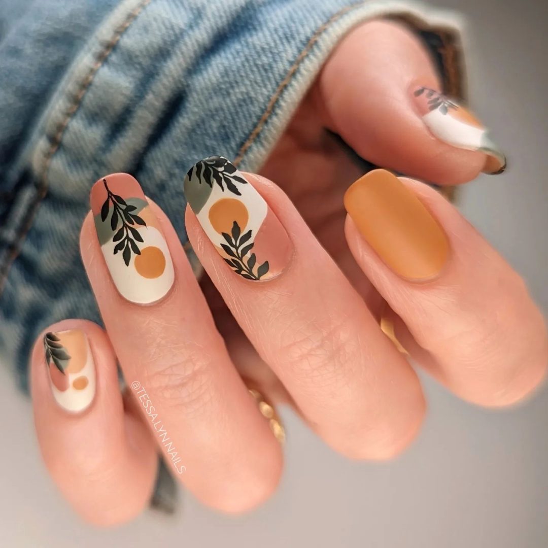 Muted fall nails with fall foliage nail art