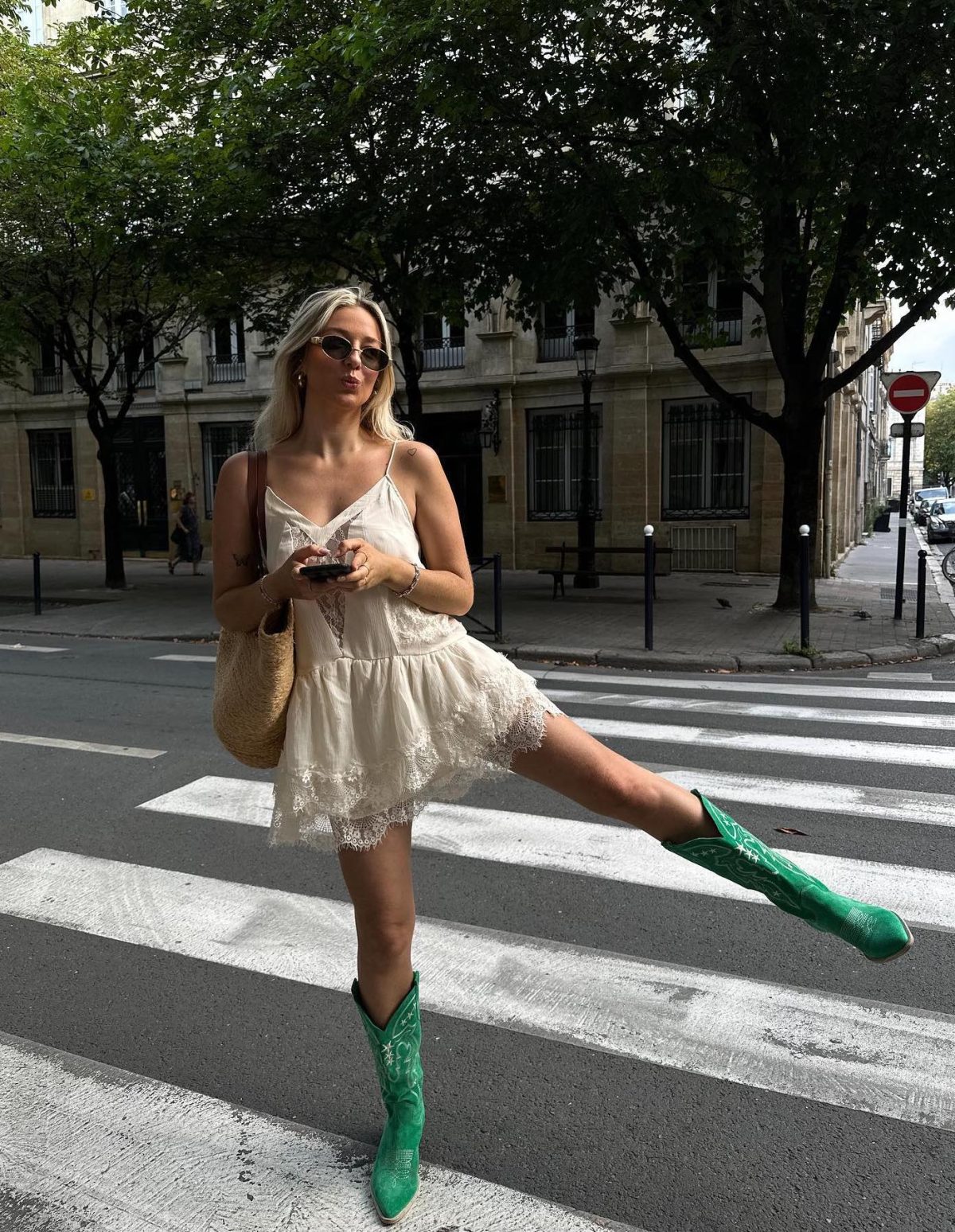 Cute rodeo outfit with colorful green cowboy boots.