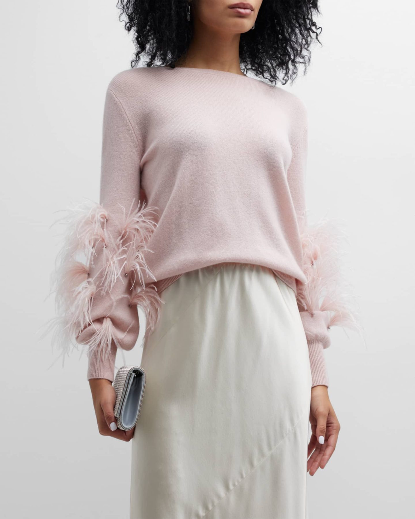 Light pink cashmere sweater with feathers