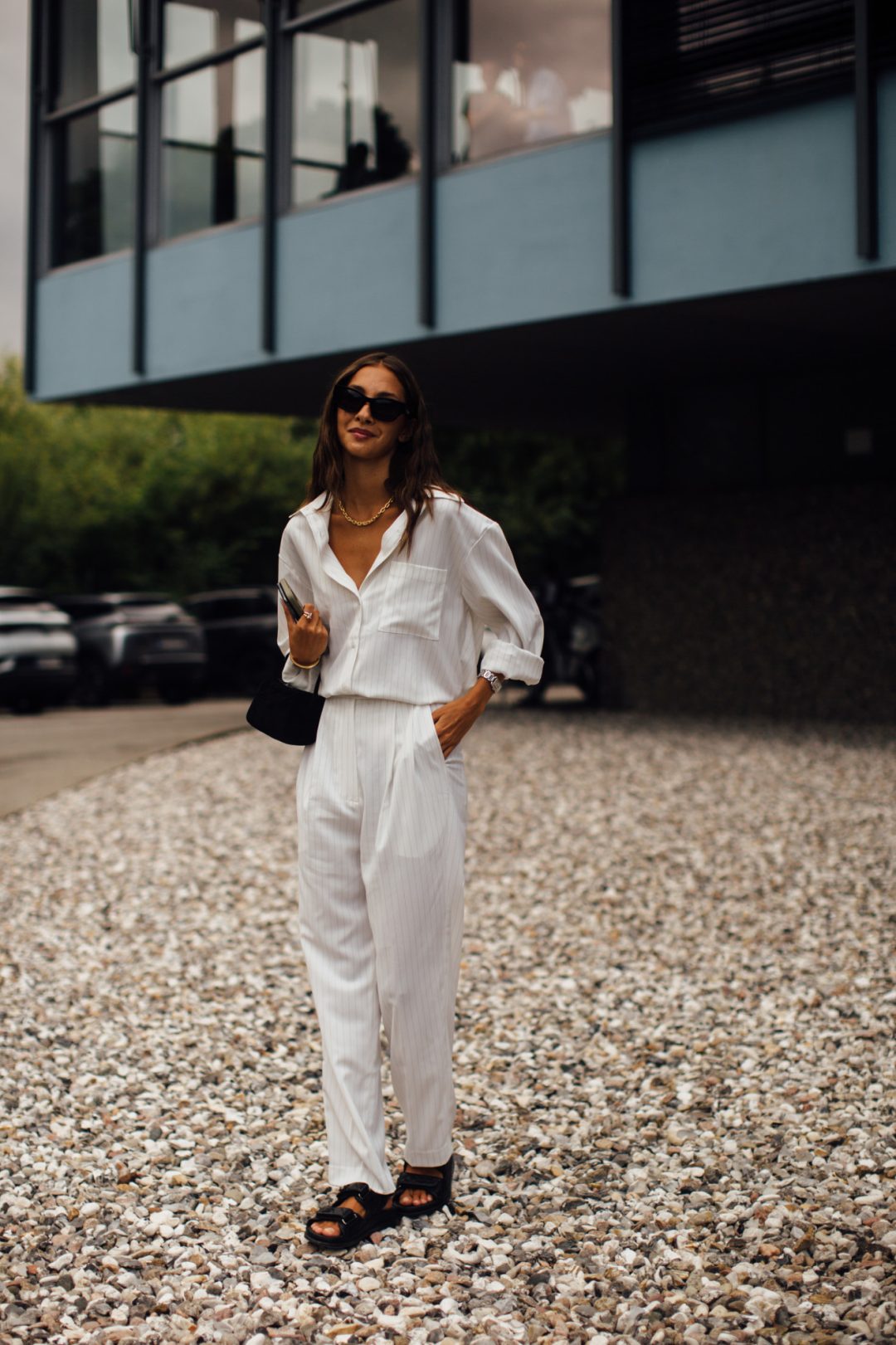 Striped White Shirt Styled with matching Pants and Black Dad Sandals