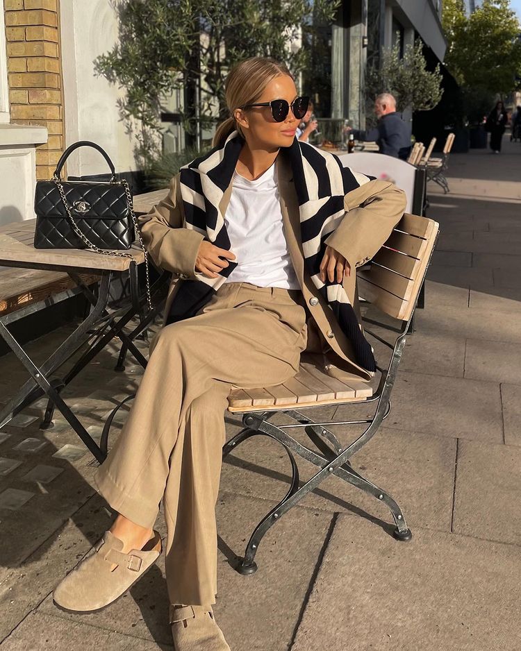 Chic outfit with beige wide leg trousers and Birkenstock Boston clogs