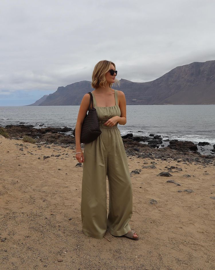 Olive green summer jumpsuit with matching Birkenstock sandals