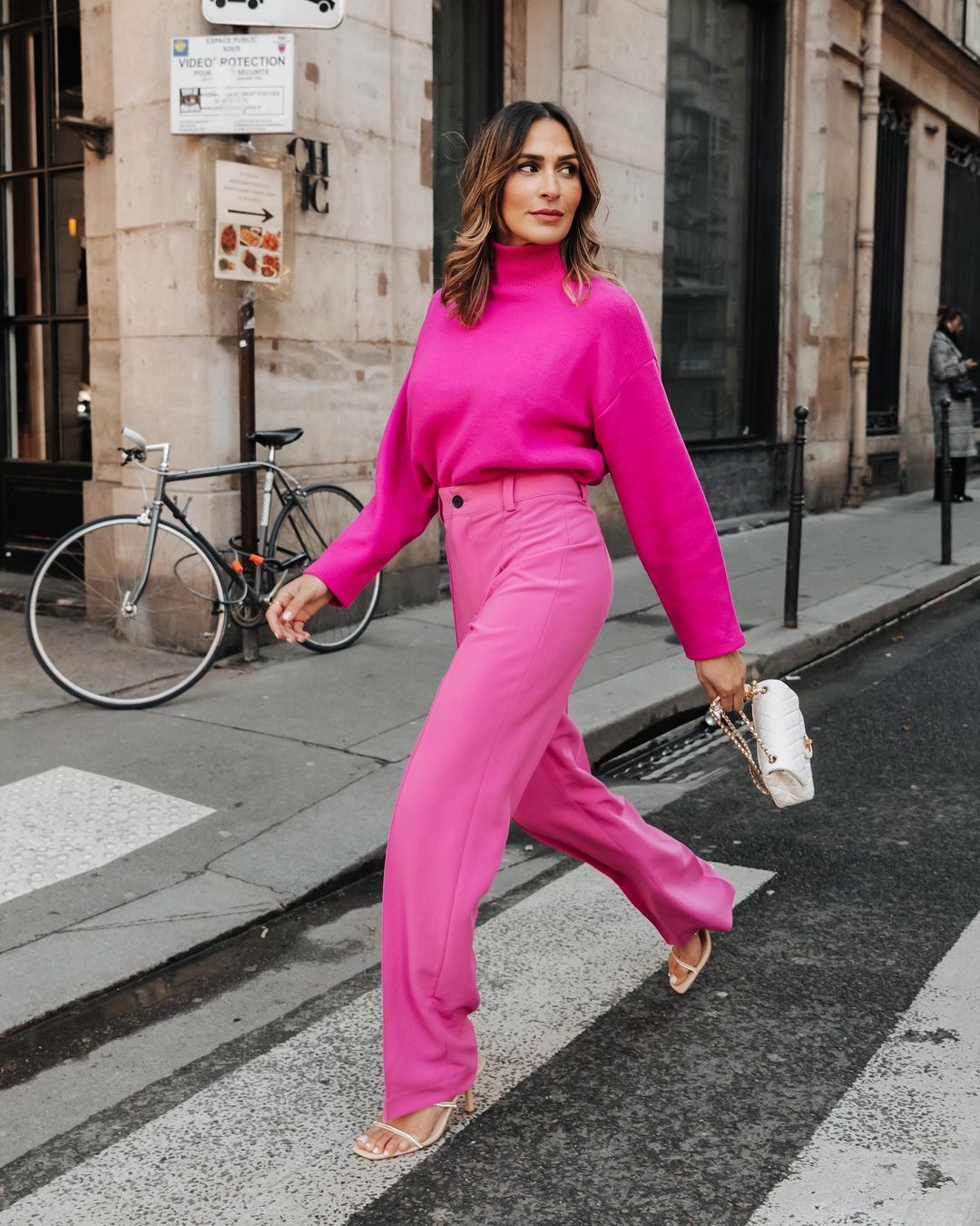 Chic and colorful outfit with hot pink pants and sweater