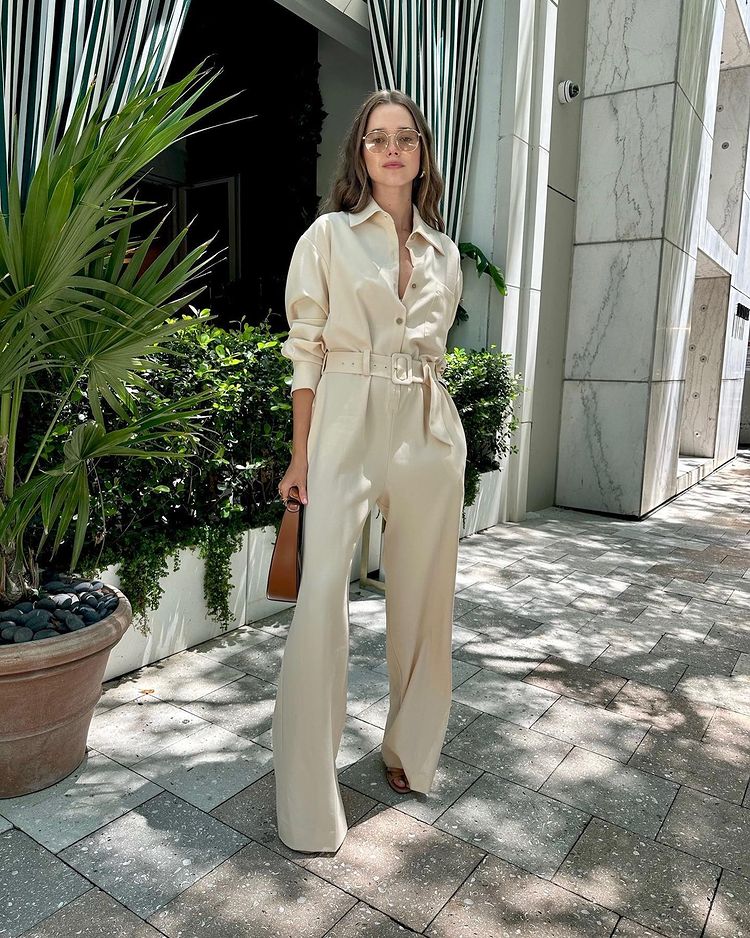 Chic white jumpsuit outfit with belt