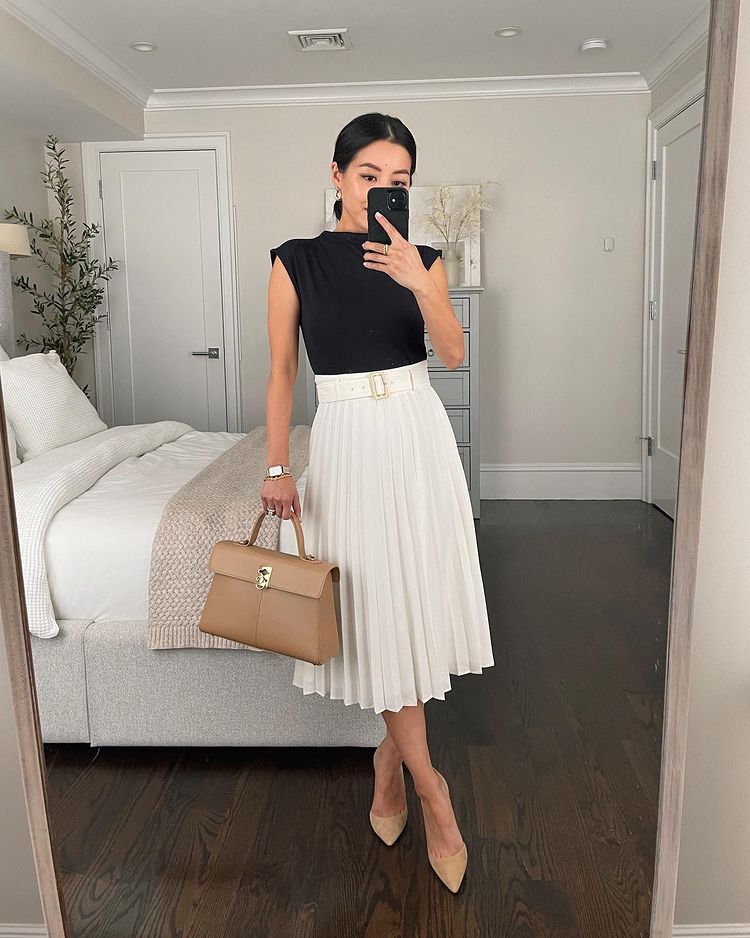 Chic church outfit with pleated skirt for baptism