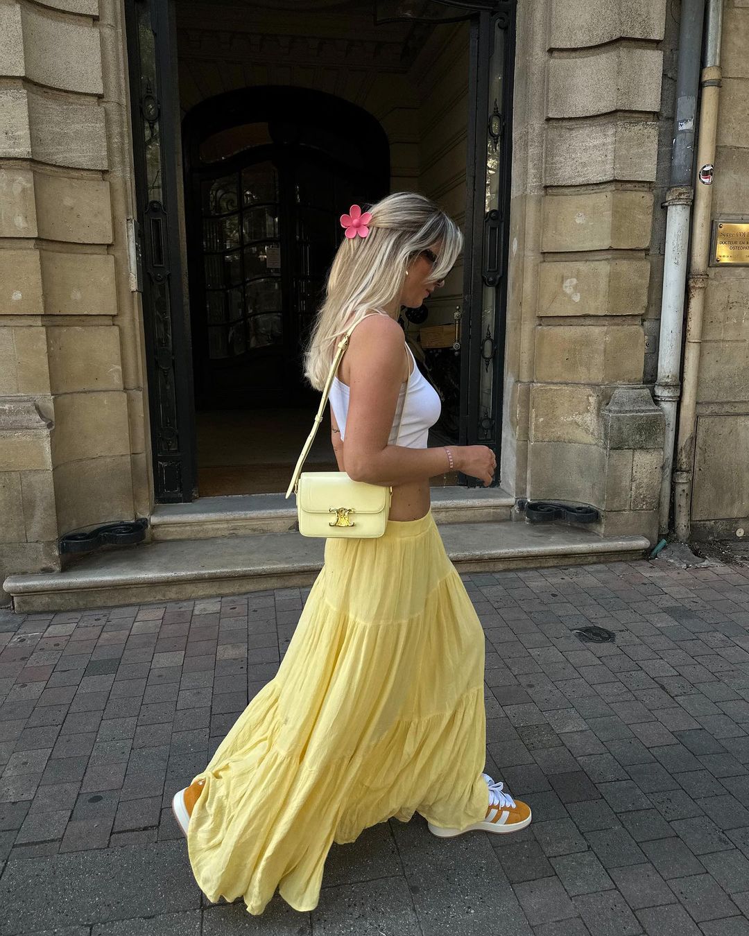 Casual yellow maxi skirt outfit with yellow Celine Triomphe bag