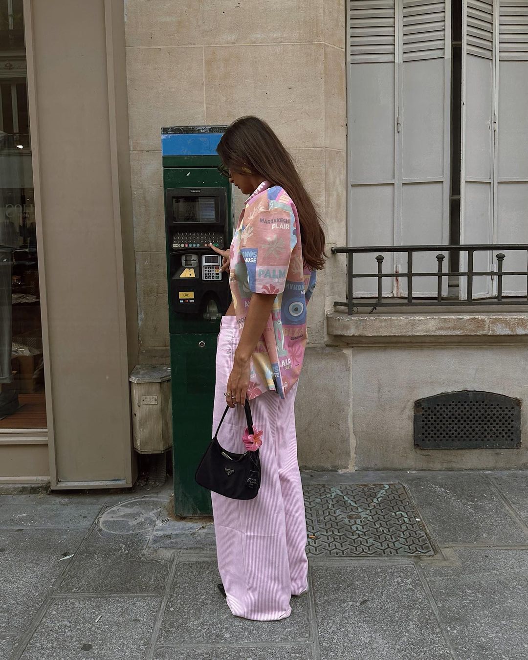 Light pink pants outfit with graphic shirt