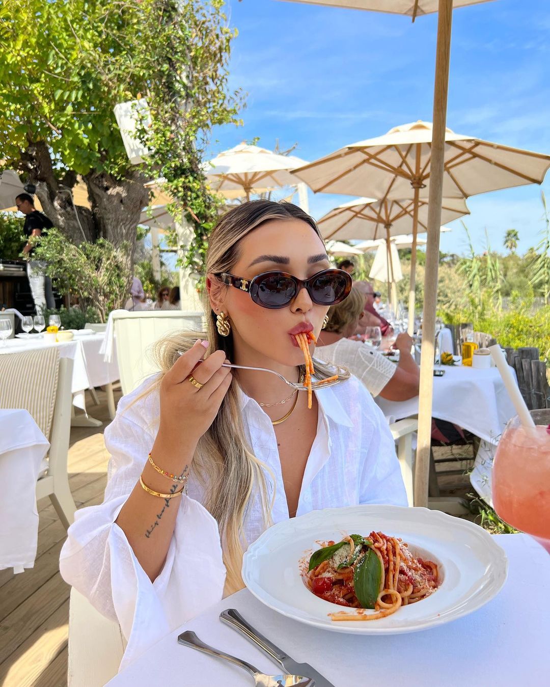 Chic white linen shirt outfit for South Of France