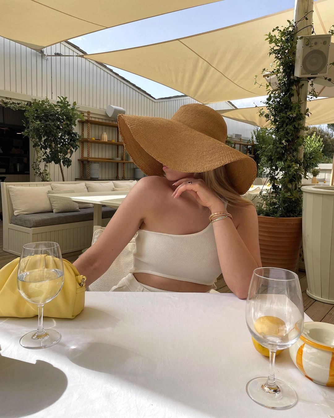 Classy South Of France outfit with large straw hat