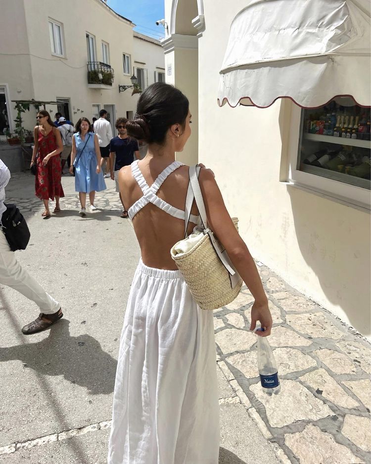 Casual white summer dress with beach bag