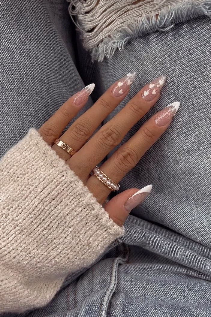 White French tip nails with hearts