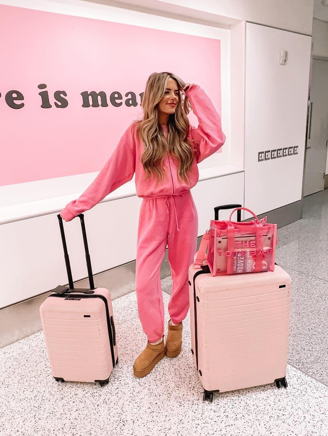 Pink airport outfit with Ugg Tasman slippers