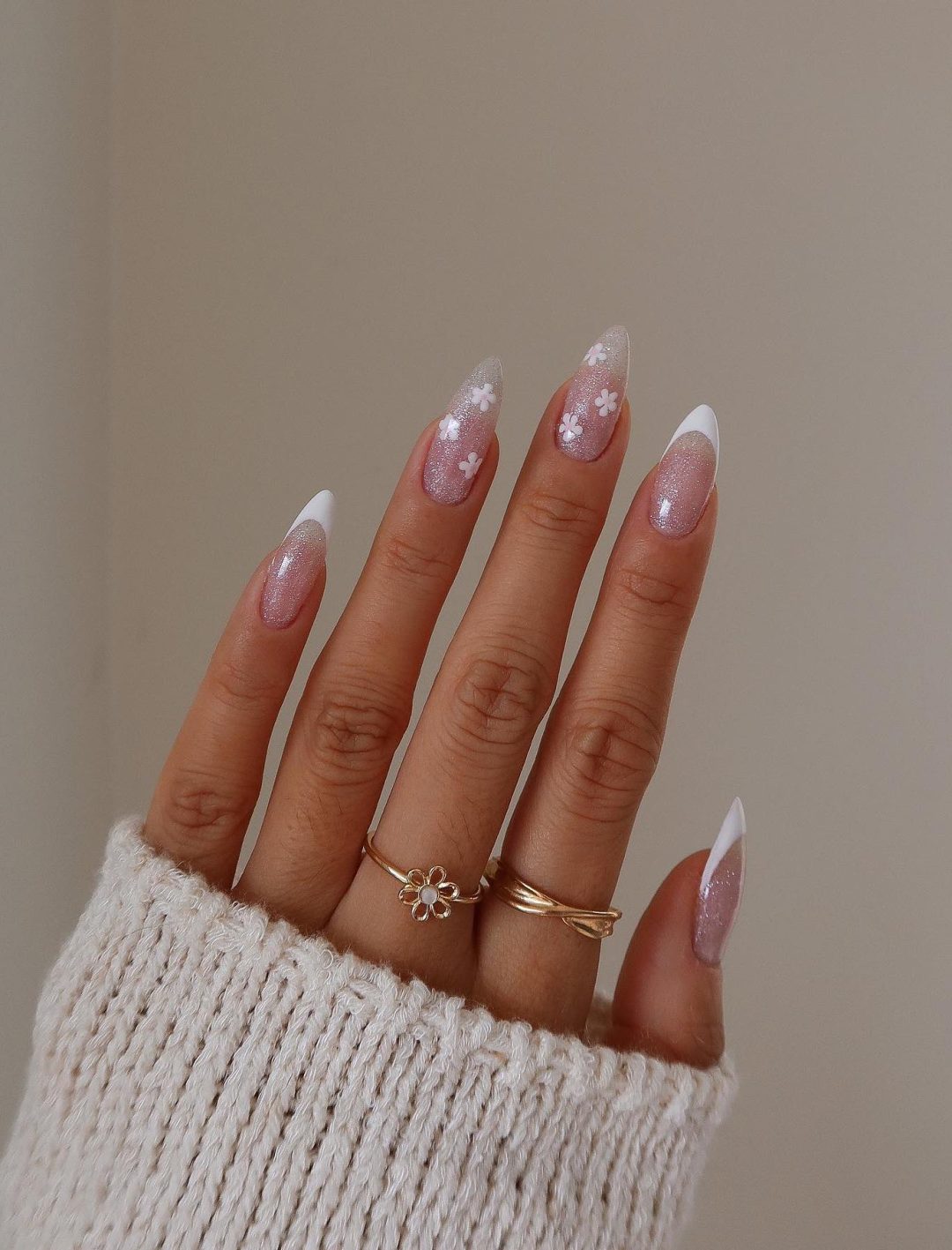 White French tip nails with flowers