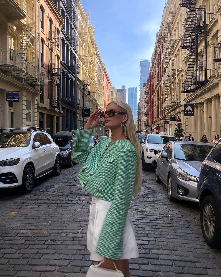 Preppy old money outfit with green tweed blazer and white shorts