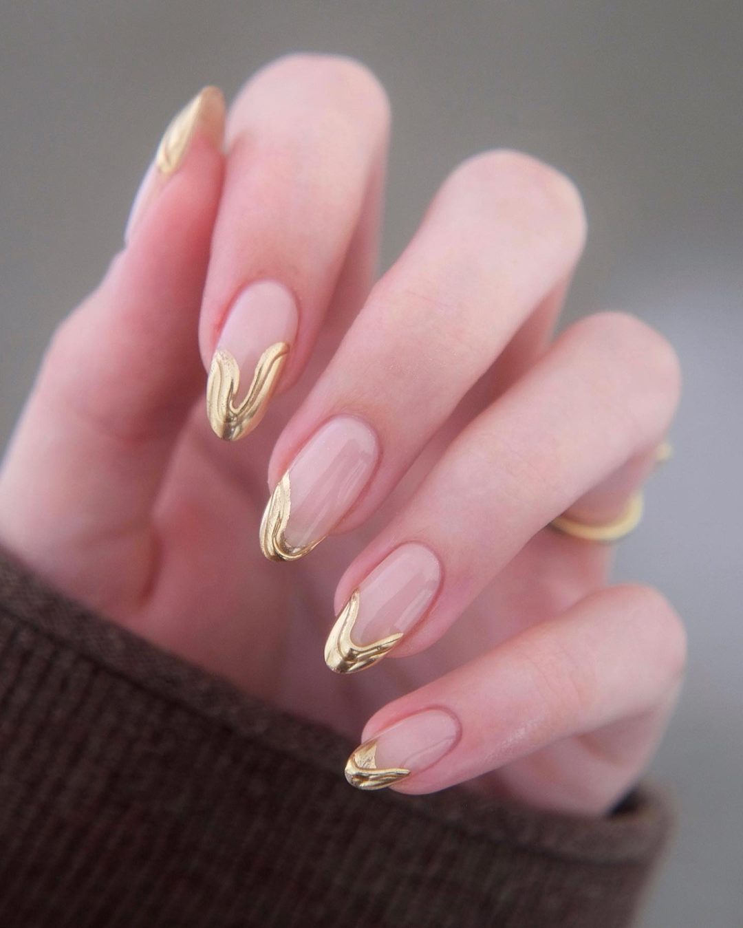 Gold French tip nails