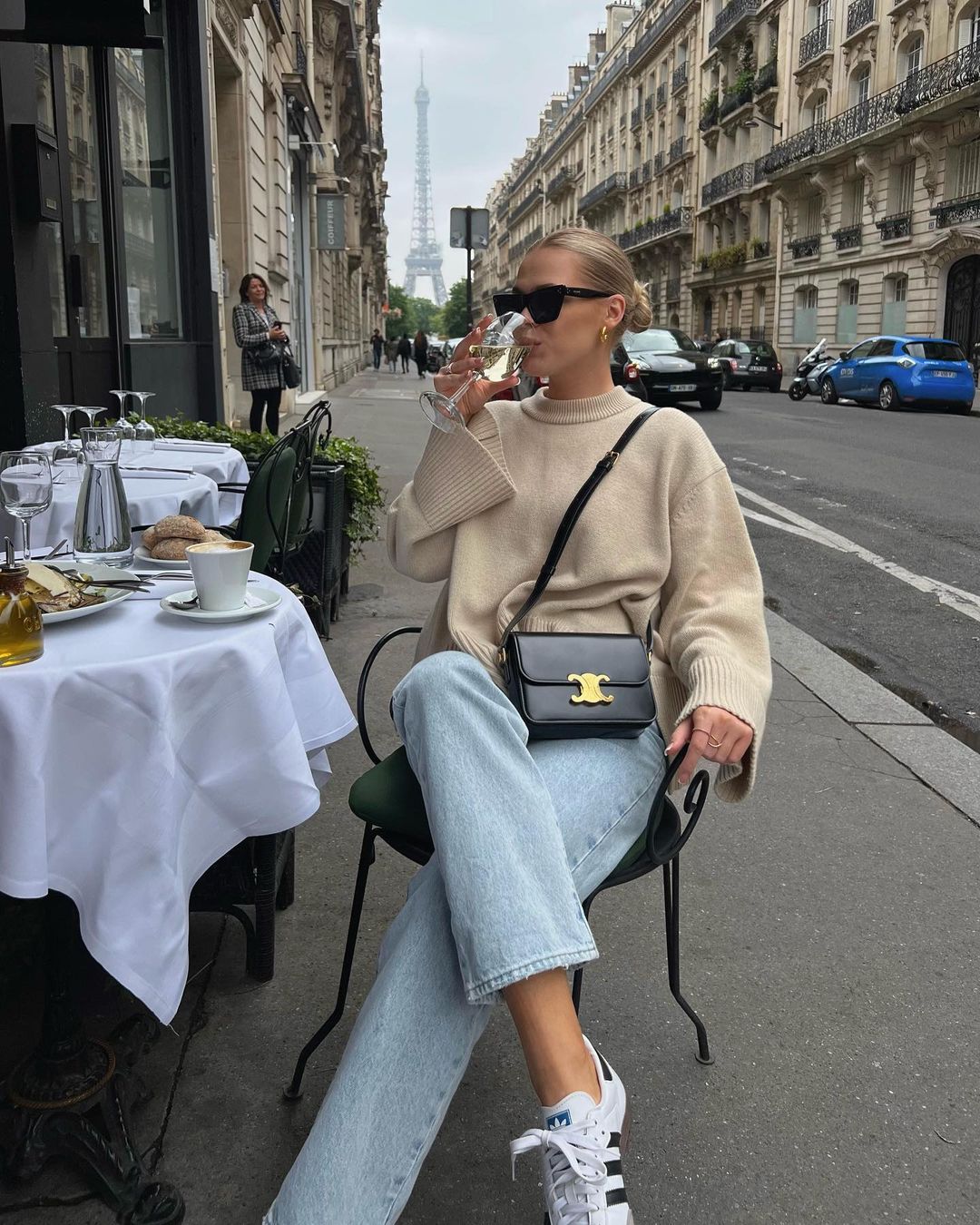 Casual fall outfit with beige sweater and Adidas Samba sneakers