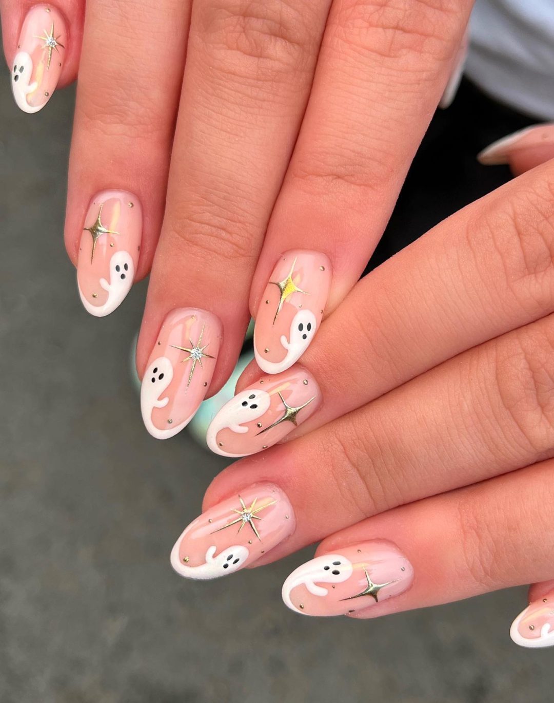 Cute ghost Halloween nails.