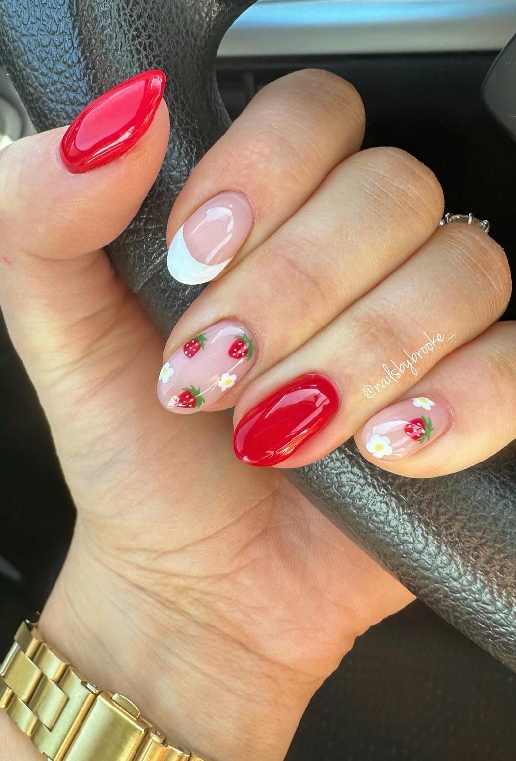 White and red strawberry nails.