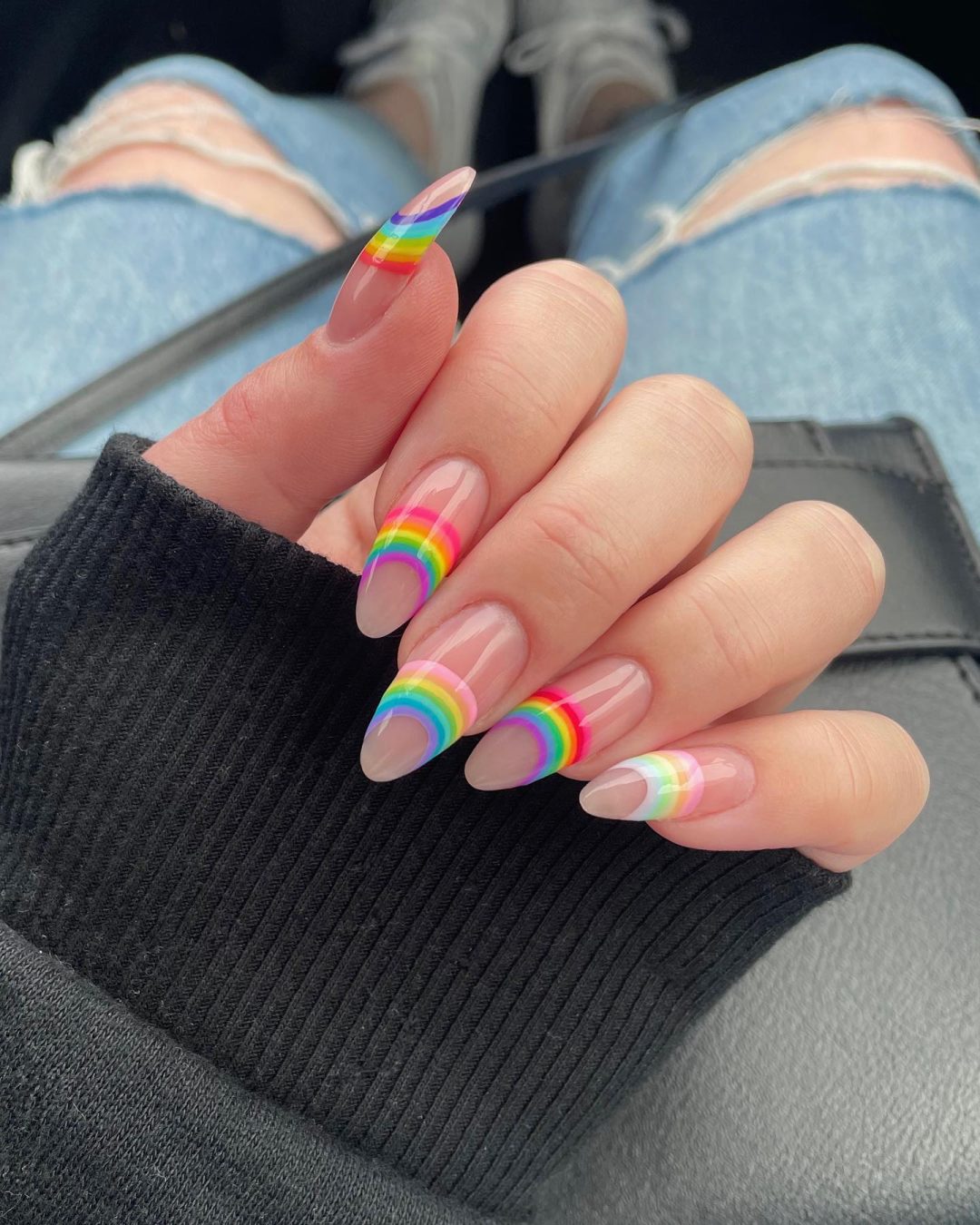 Long minimalist rainbow nails on nude canvas.