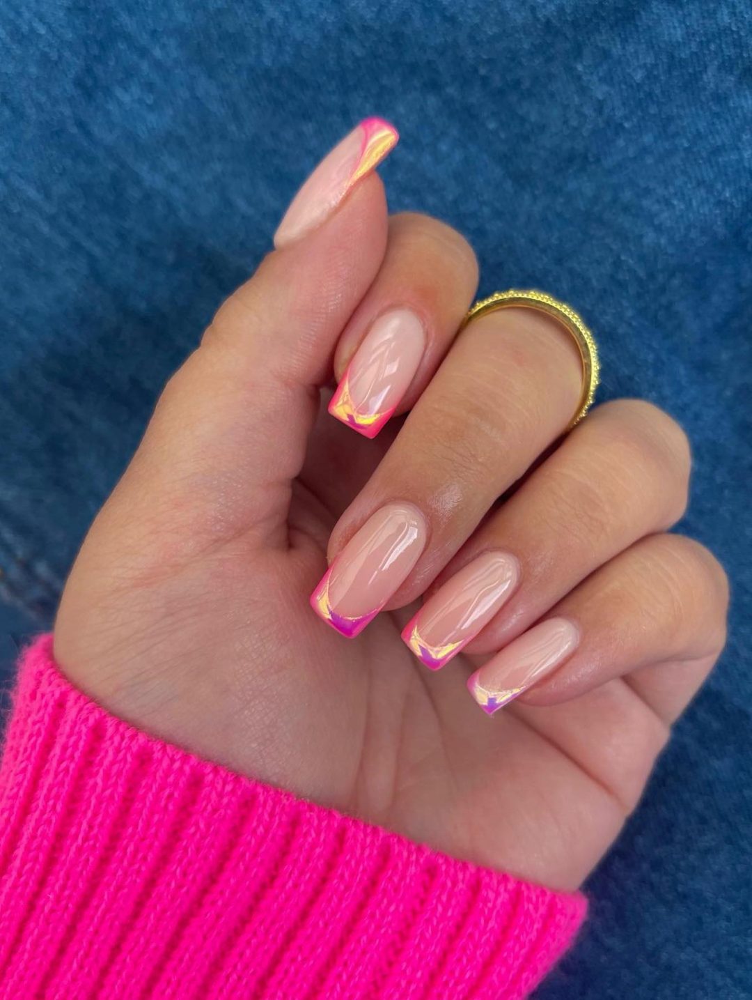Pink chrome French tip nails.