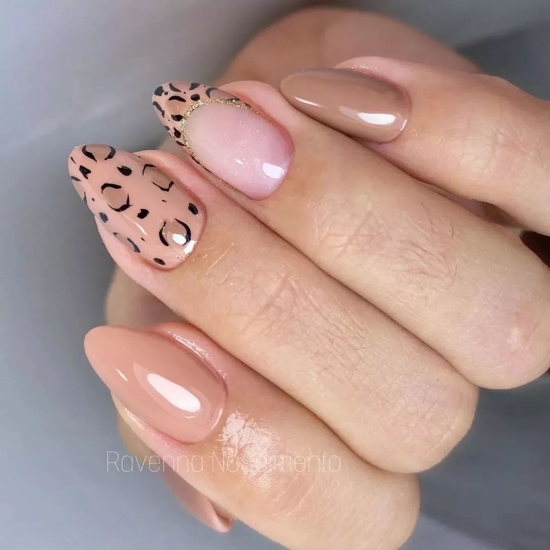 Neutral leopard print nails.