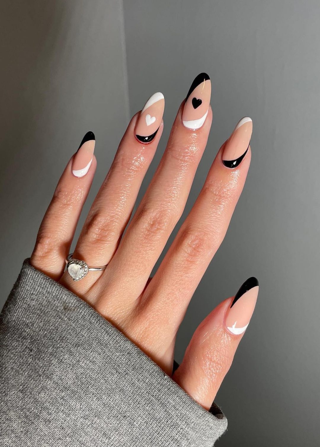 Minimalist black and white nails with hearts