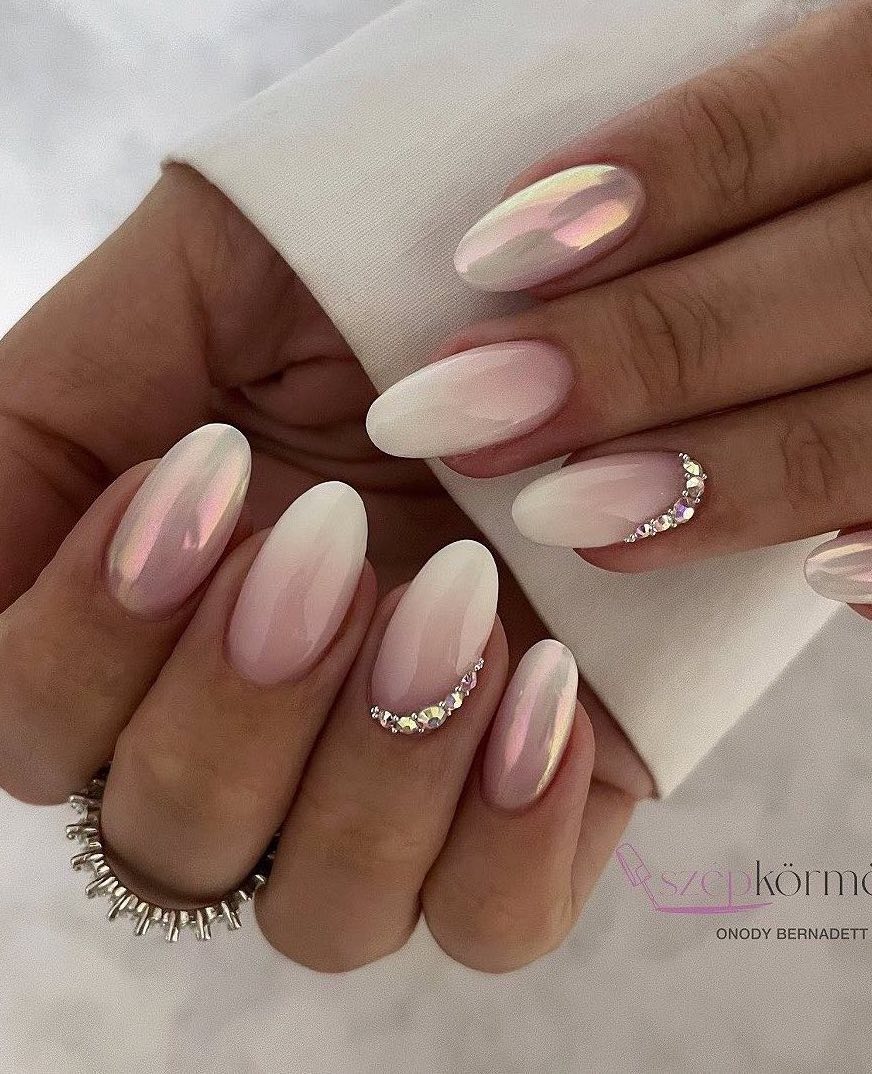 Pink and white ombre nails with bling.