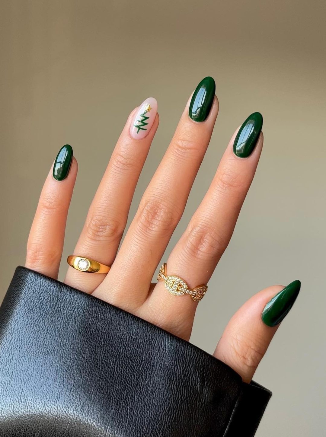 Emerald green Christmas tree nails.