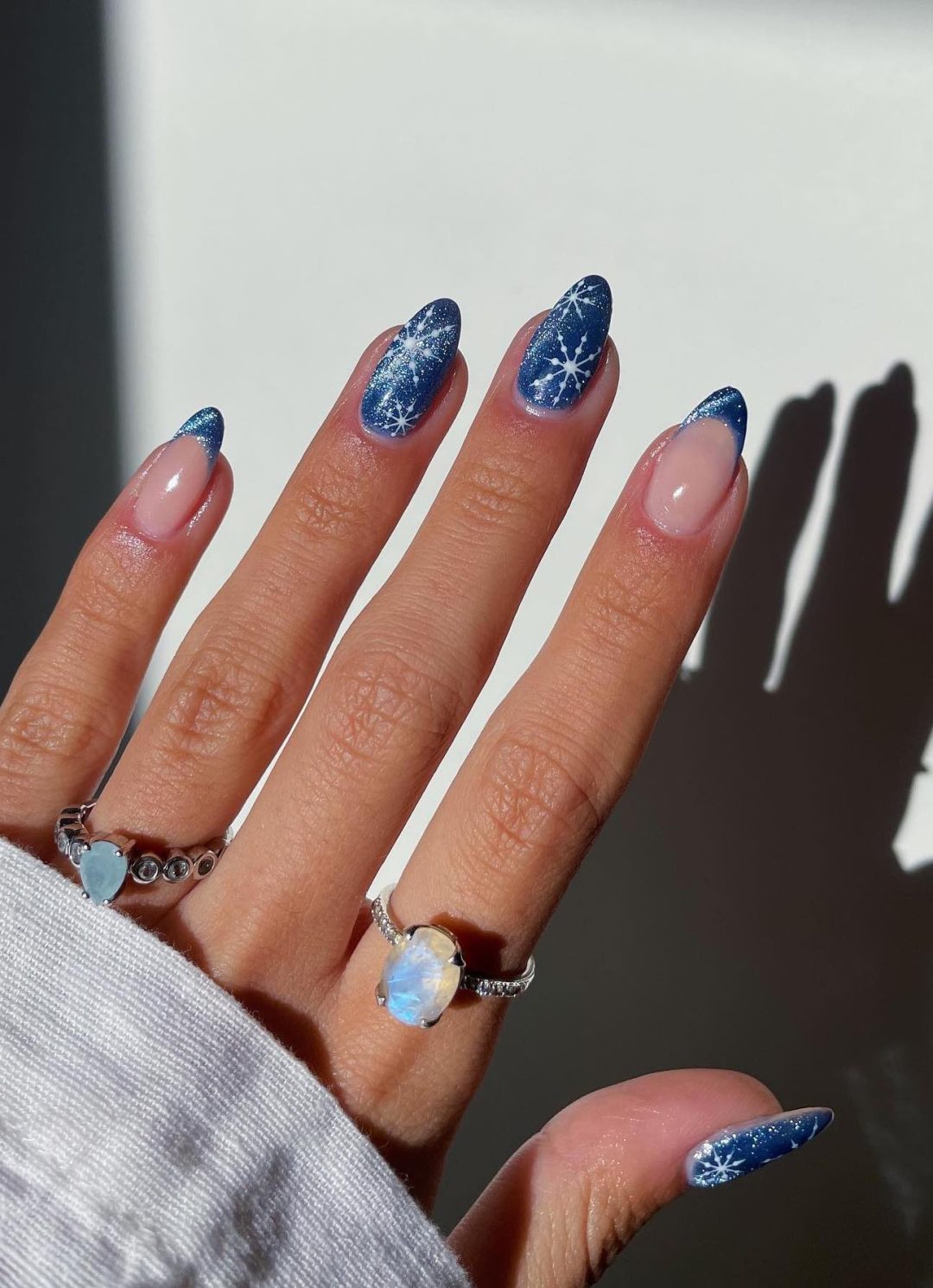 Blue winter nails with snowflakes.