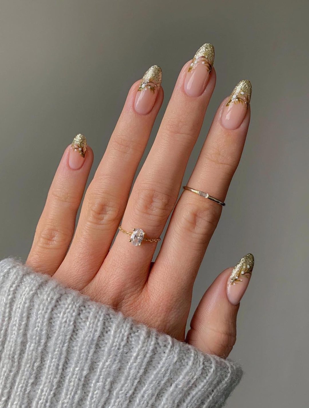 Gold French tip nails for Christmas.