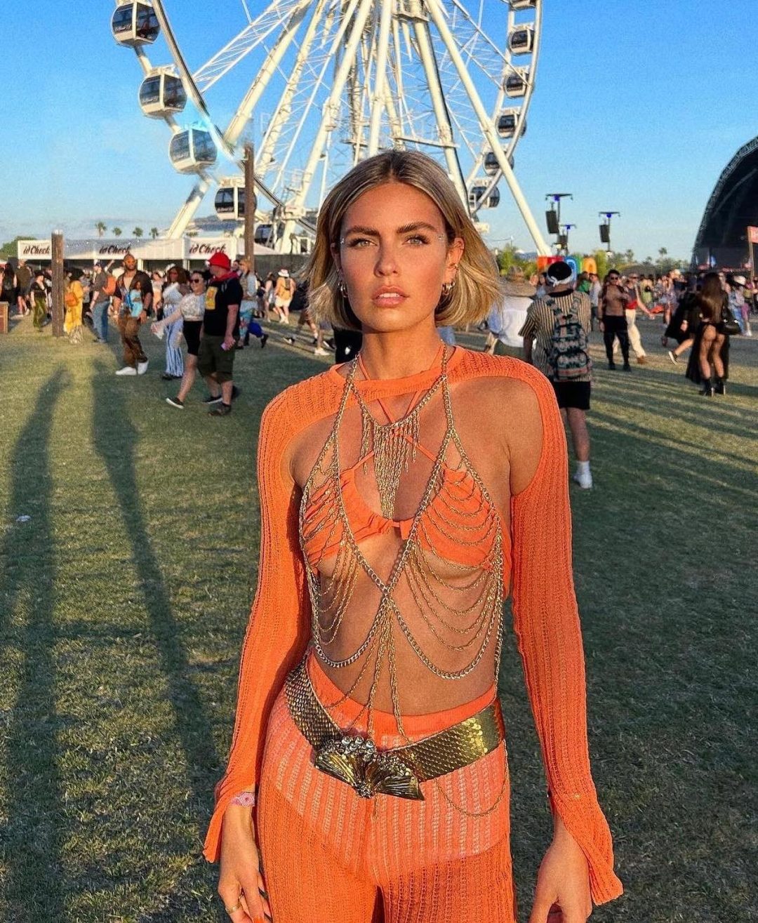 Orange Coachella outfit with mesh.