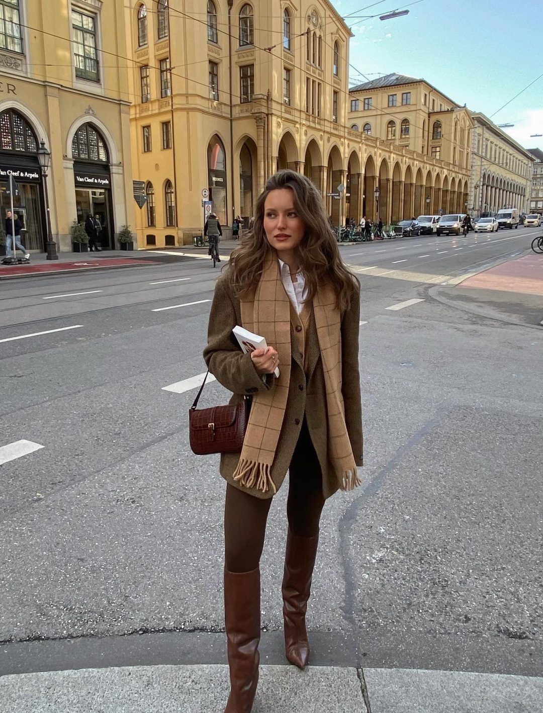 Dark academia fall look with brown knee boots and blazer.